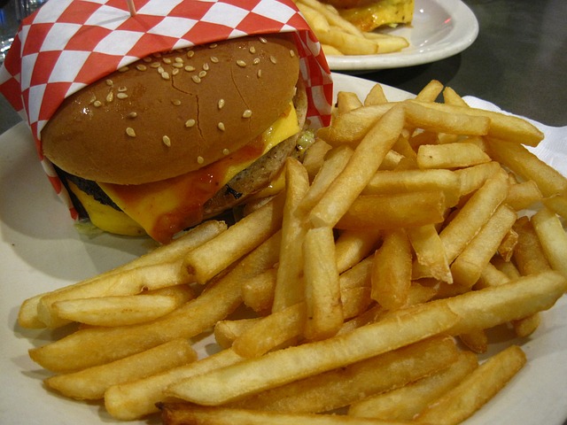 A burger and fries on a plate