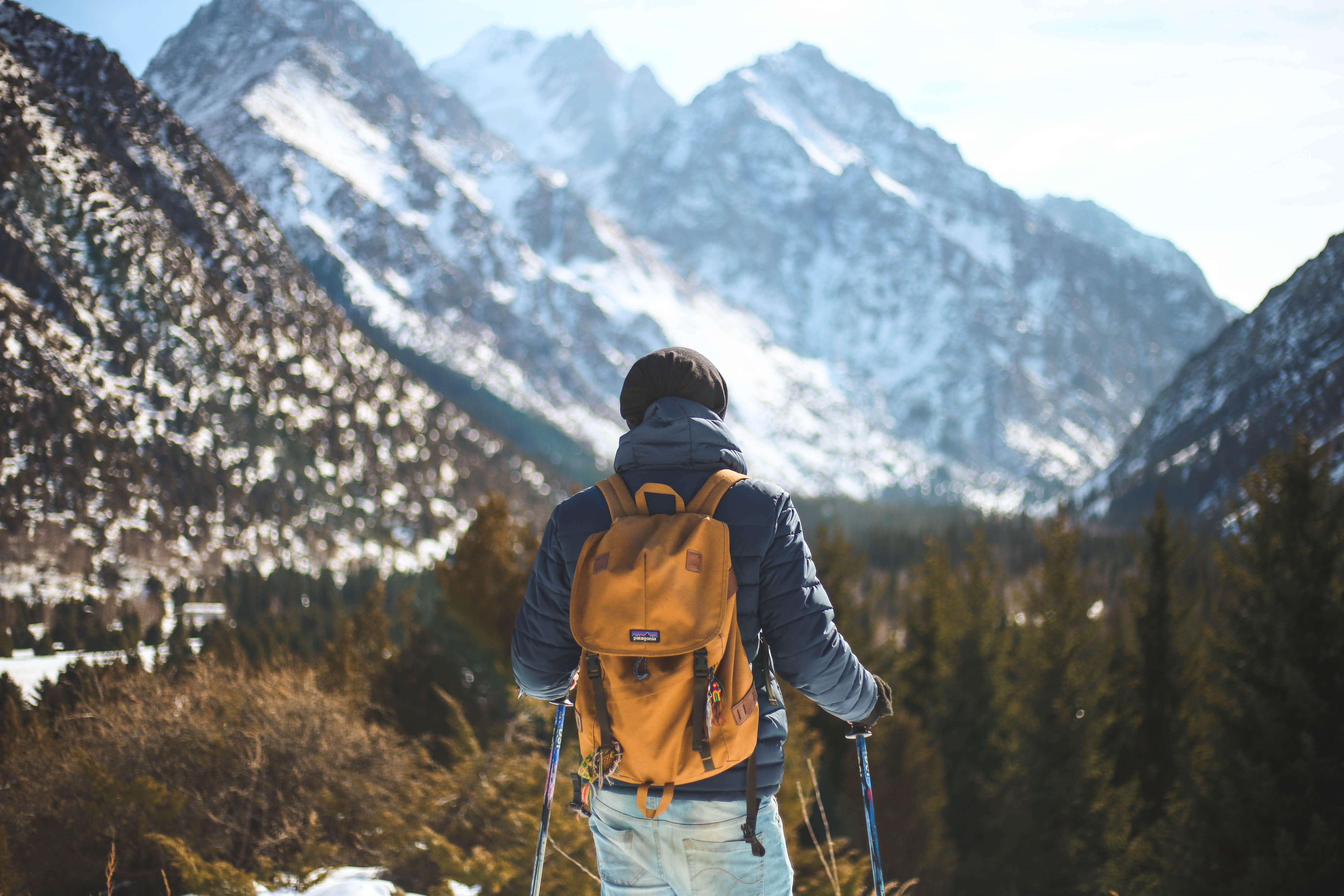 An adventurer wearing a backpack