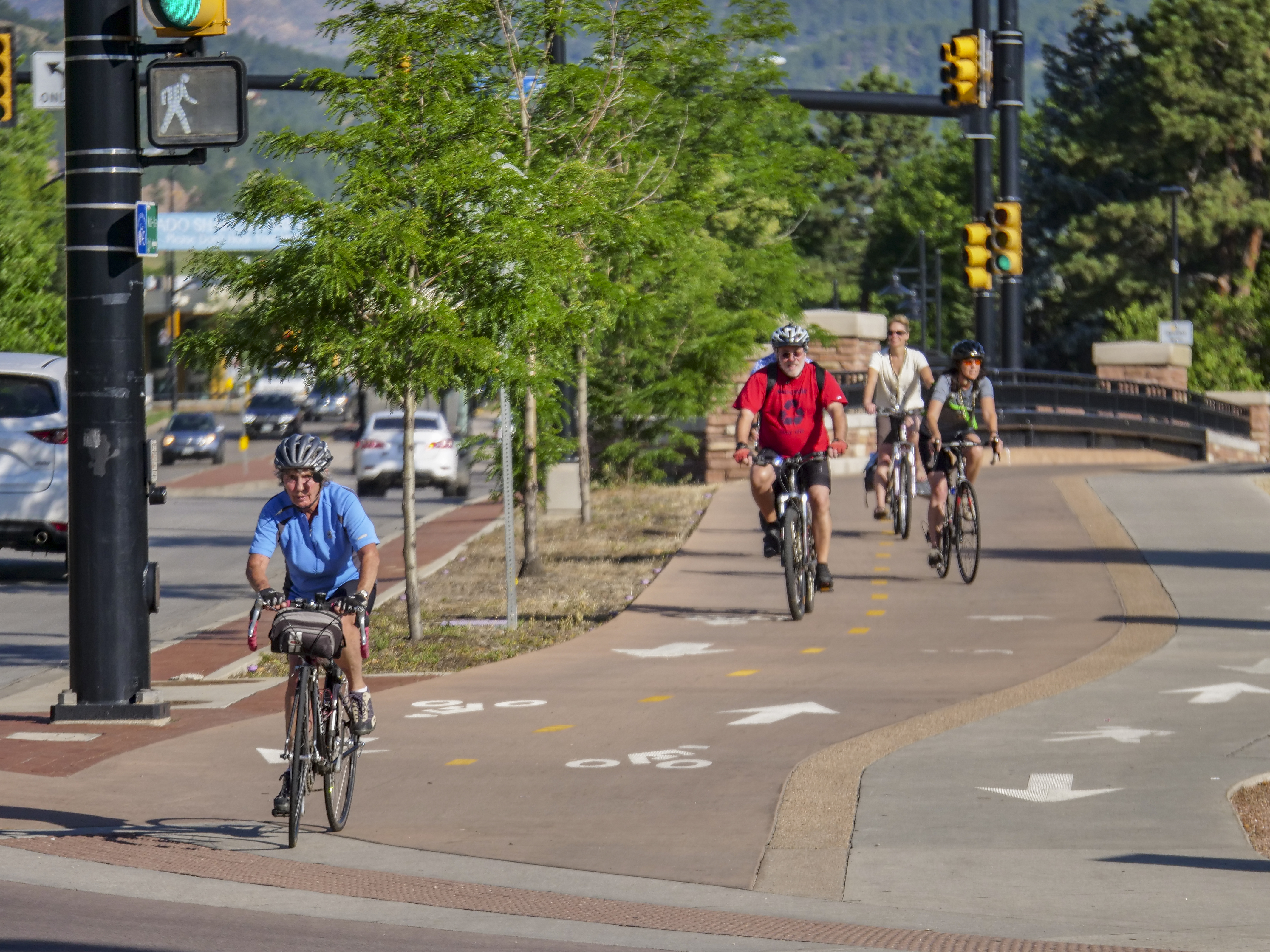People participate in Bike To Work Day in Boulder