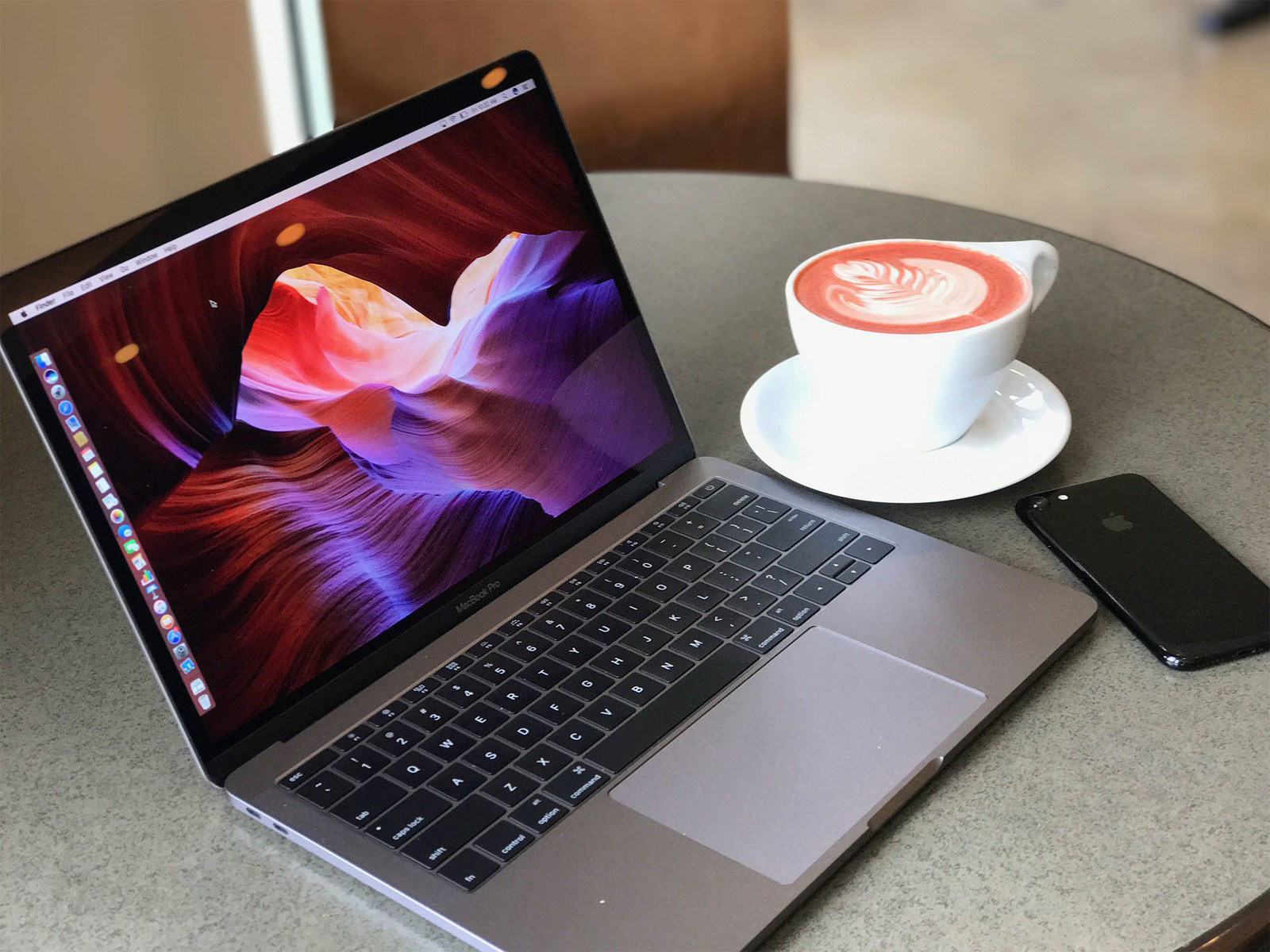 Macbook Pro and cup of coffee