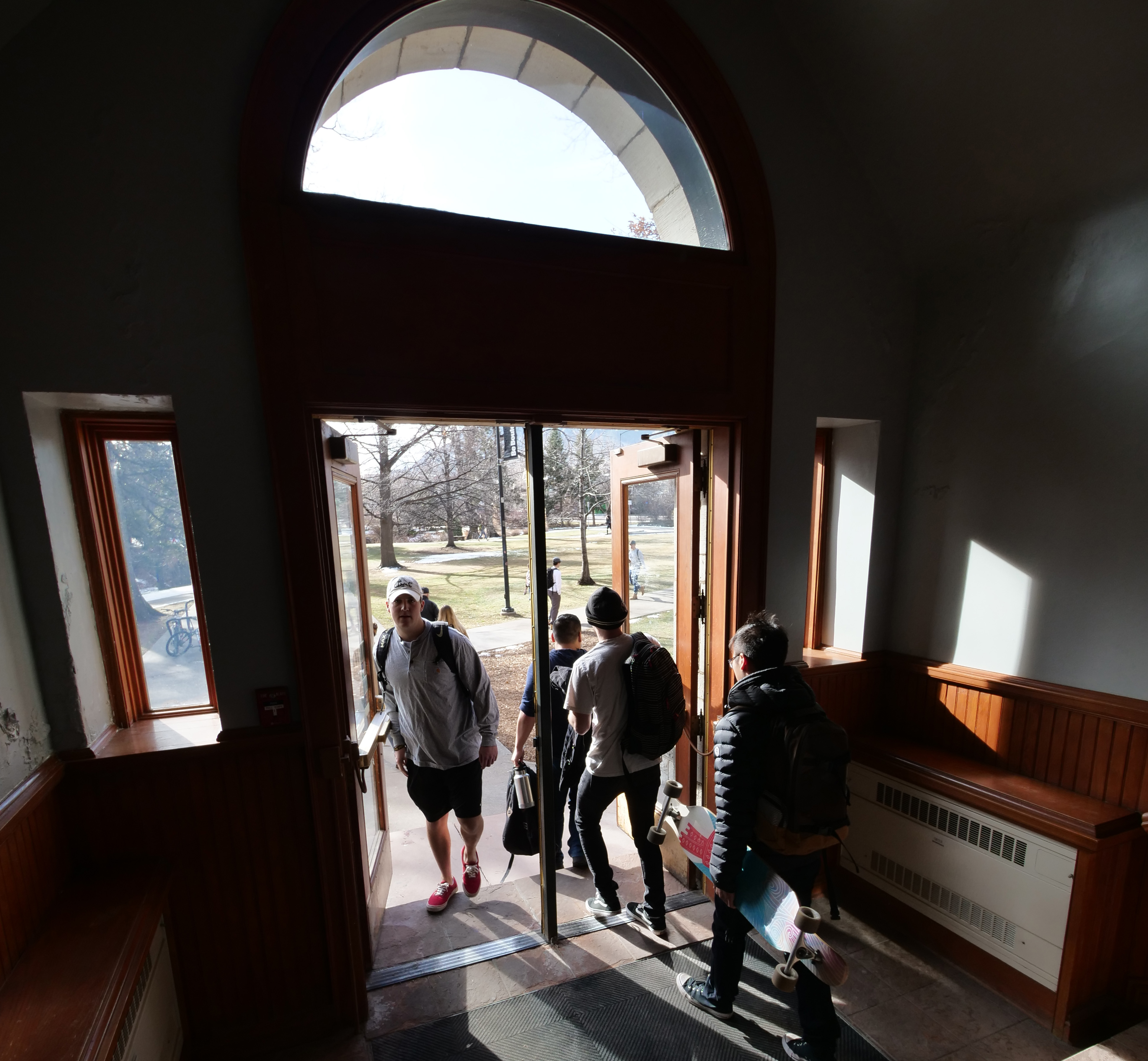 Students file through a doorway in the Hale Science building at the University of Colorado Boulder. (Photo by Casey A. Cass/University of Colorado)