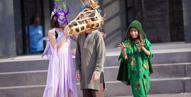 kids performing Shakespeare on stage