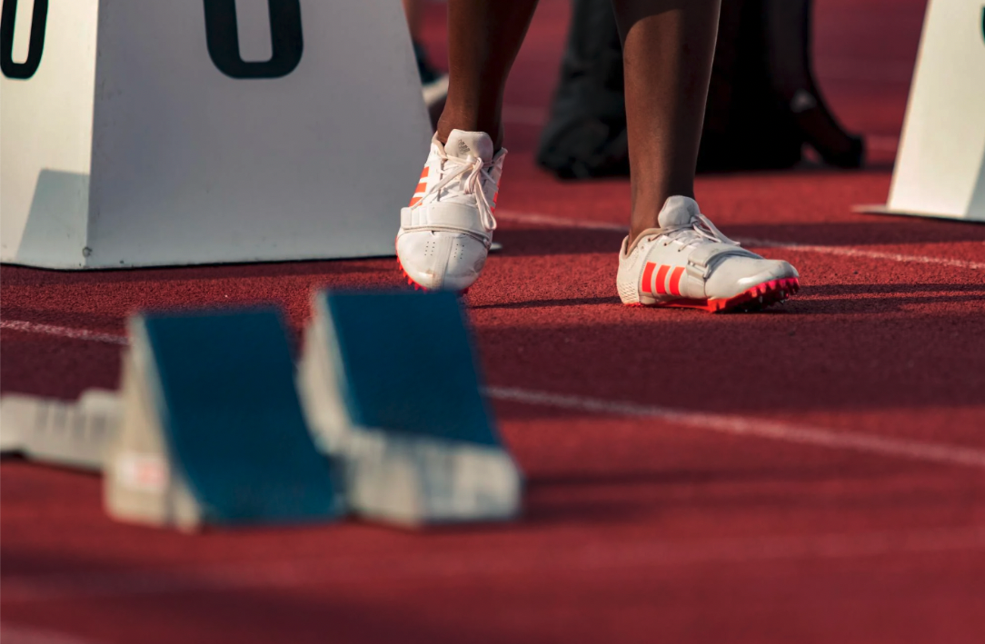 Close-up of a track athlete's feet while running