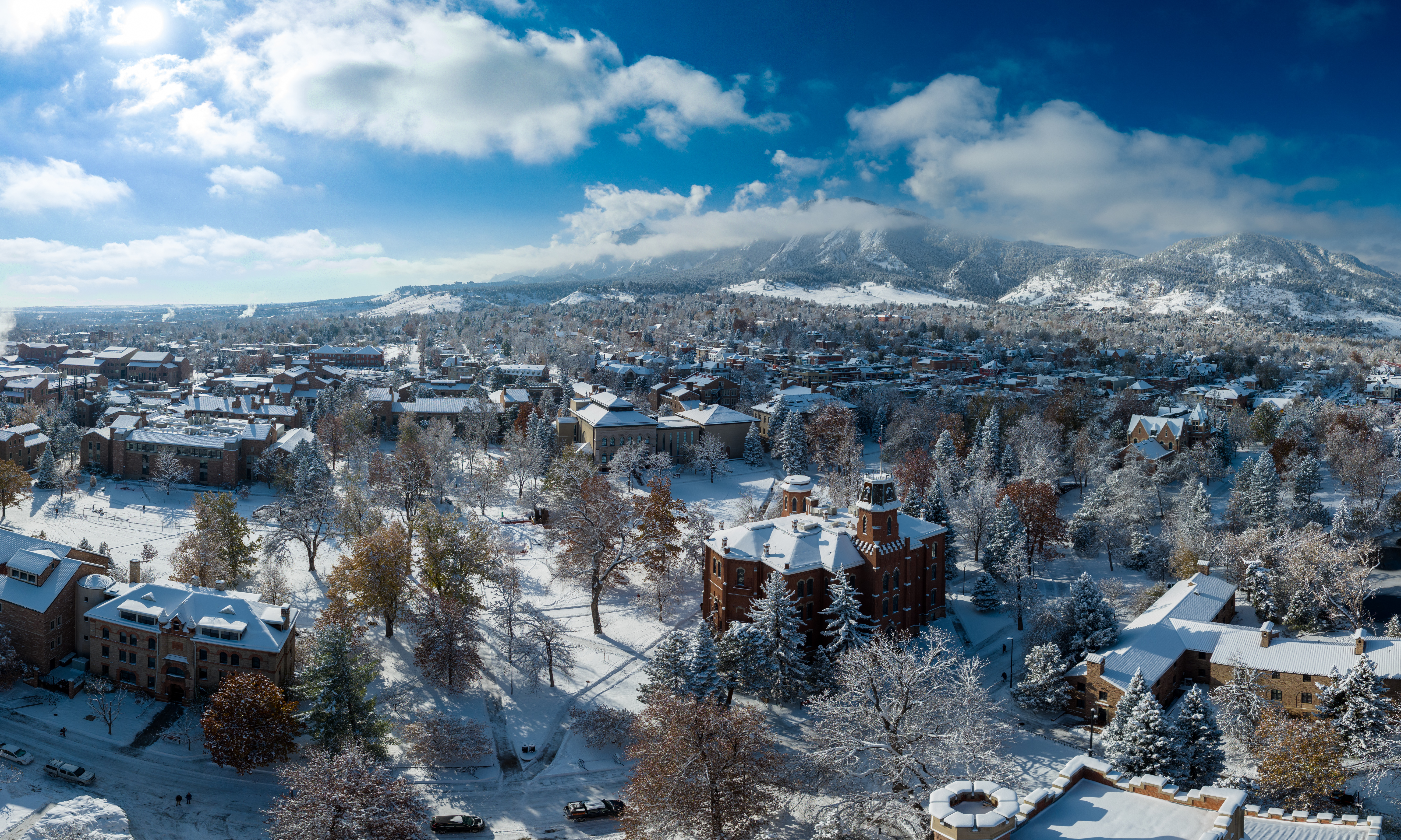 An aerial view of a snow-dusted Main Campus.