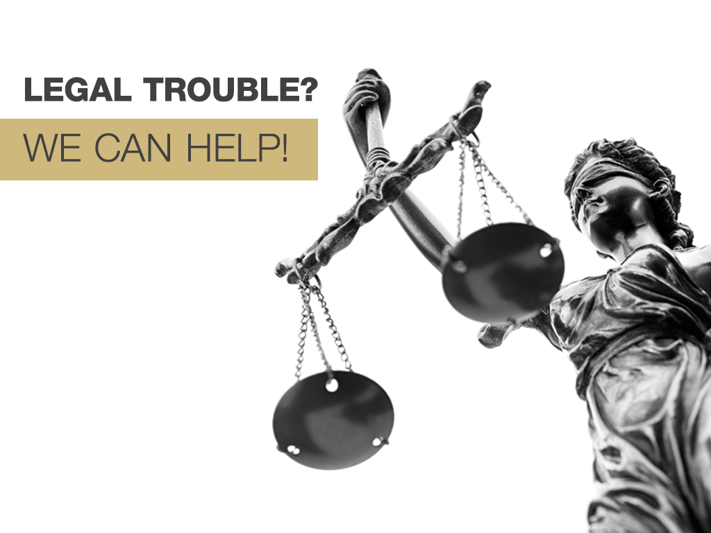 Lady Justice with text that reads 'Legal trouble? We can help.'