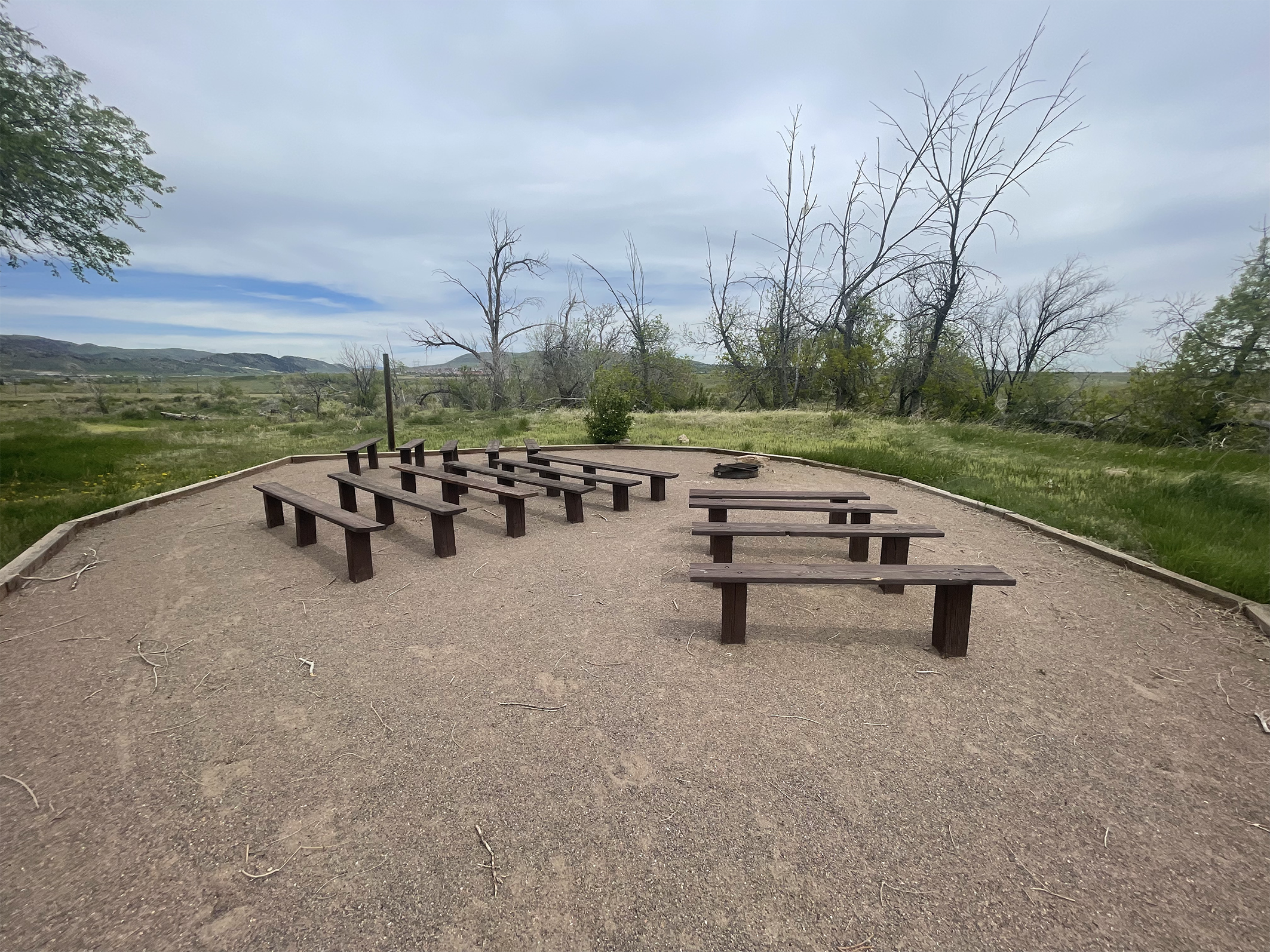 Rows of benches at a campground