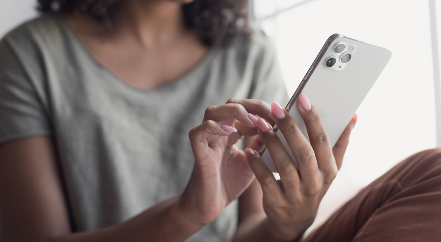 woman on iPhone