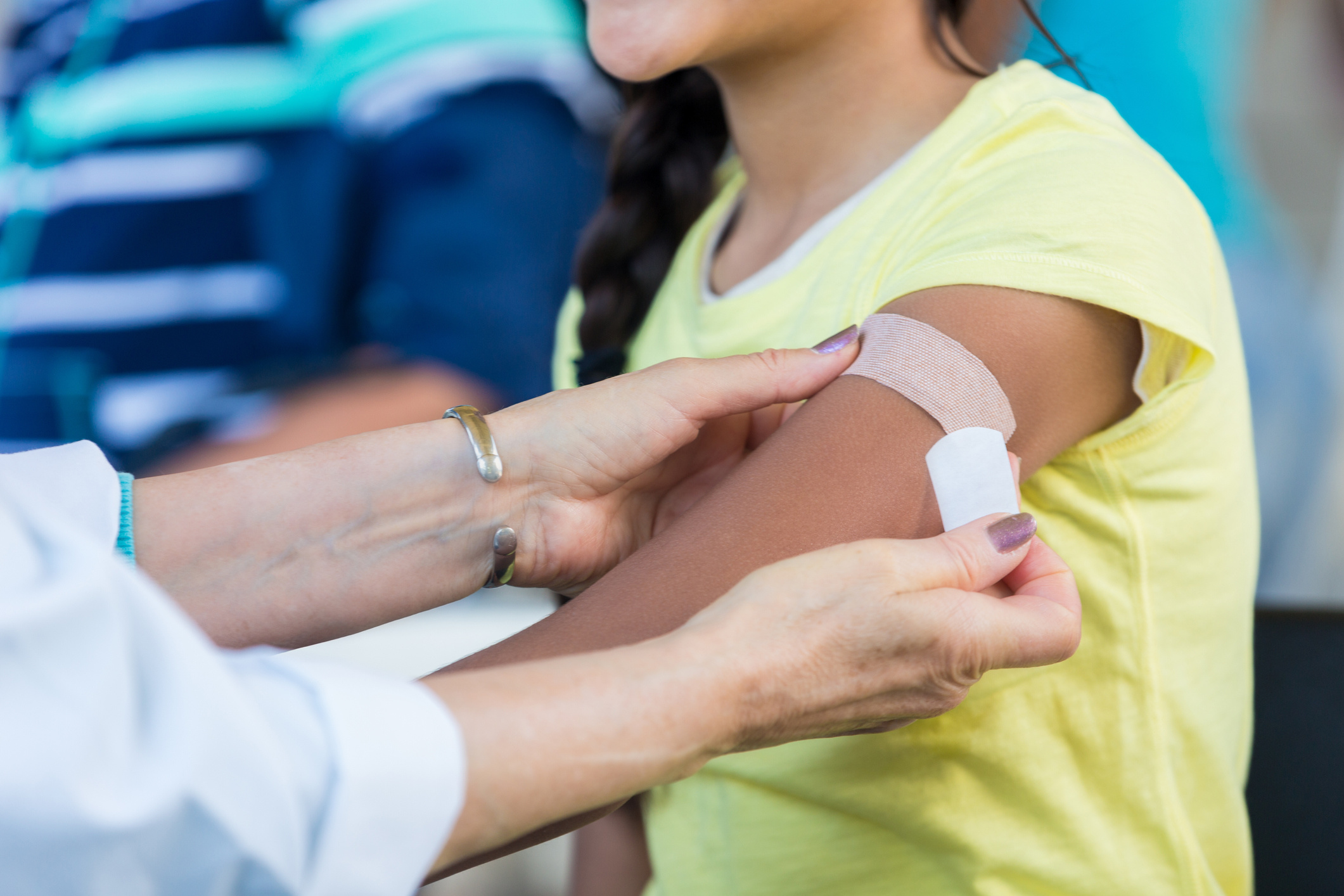 student getting a flu shot