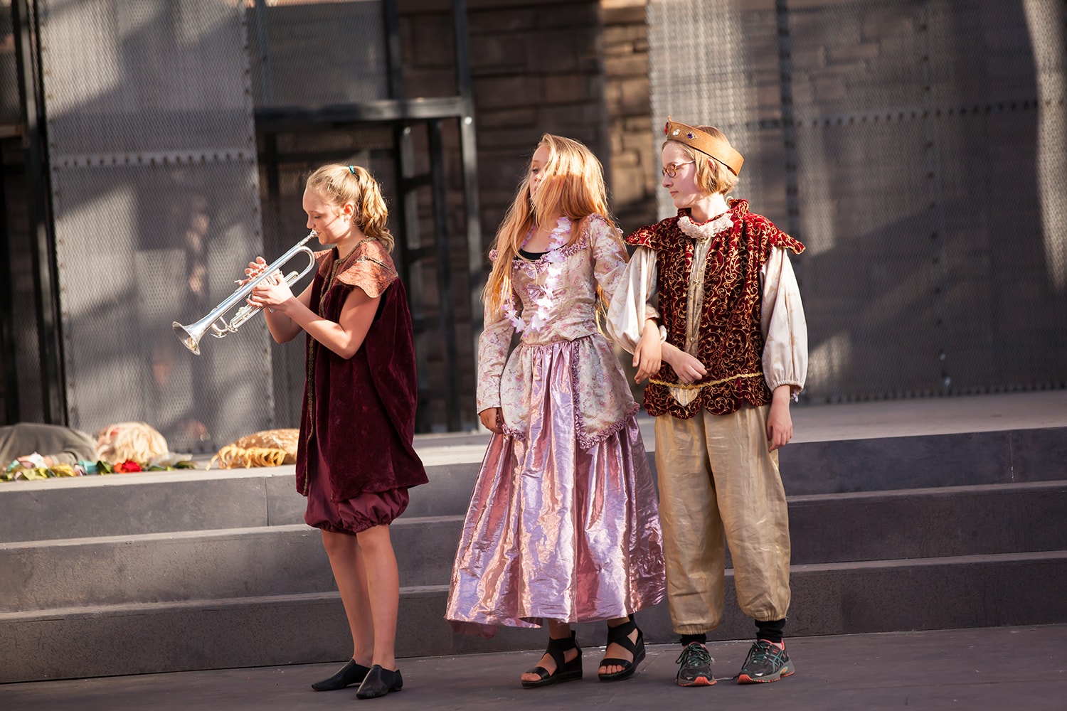 Kids performing Shakespeare on stage