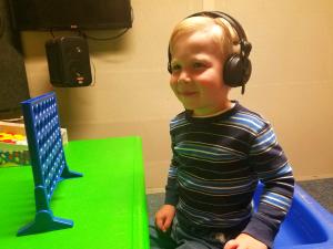 Child participating in hearing research